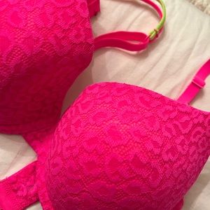 Pink bra with a neon green strap